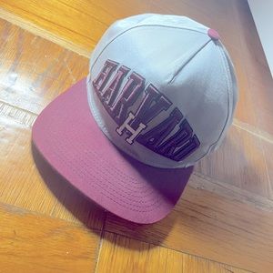 New Era Crimson and Gray Harvard snap back.